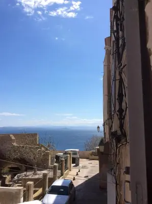 a view of the ocean from a building at Au cœur de la cité médiévale avec petite vue mer in Bonifacio