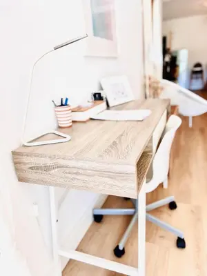 a desk in a room with a lamp at Loft entre mer et campagne à 5 min d'Ajaccio classé 4 étoiles in Alata