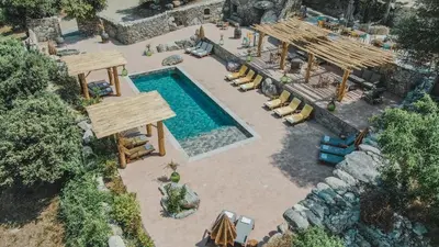 an overhead view of a pool with chairs and a house at Résidence de Luxe 4 étoiles à Pietralba, 4 logements piscine chauffée BALAGNE in Pietralba