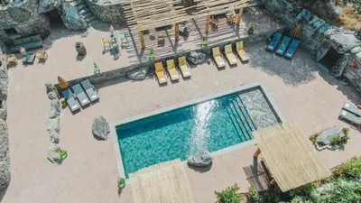 an overhead view of a swimming pool with lounge chairs at Résidence de Luxe 4 étoiles à Pietralba, 4 logements piscine chauffée BALAGNE in Pietralba