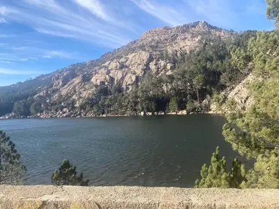 a large lake in front of a mountain at Mini-villa 1 MER in Porto-Vecchio