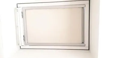a mirror on a wall with a white frame at Mini-villa 2 MONTAGNE in Porto-Vecchio