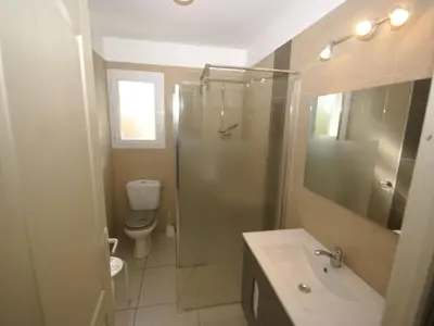 a bathroom with a shower and a sink and a toilet at Villa in Moriani-Plage near Sandy Beach in San-Nicolao