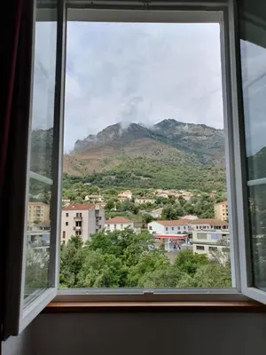 a window with a view of a mountain at Casa Guelfucci in Corte