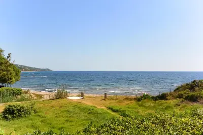 a view of the ocean from a beach at CANELLA 3 in Favone