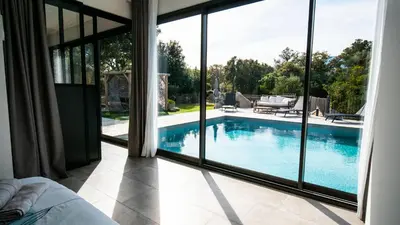 a view of a swimming pool from a house at villa rocca in Sotta