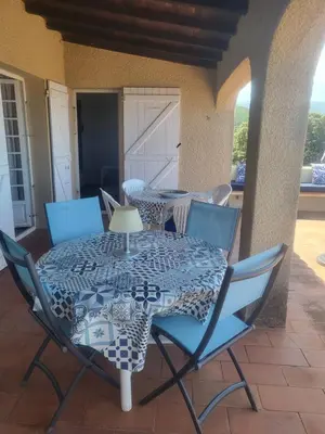 a table and chairs sitting on a patio at Villa Gasparini in Pietrosella