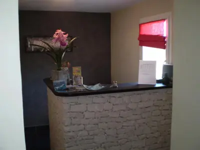 a flower sitting on a counter in a room at Augustin Marie in Bonifacio