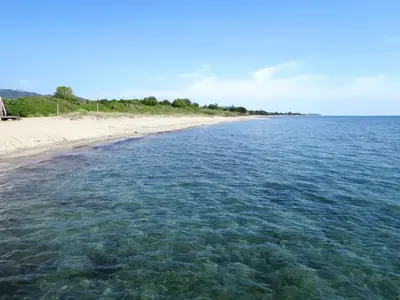 a view of the beach from the water at Apartment Dami II-1 by Interhome in Moriani Plage