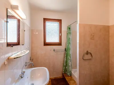a bathroom with a sink and a shower at Apartment Dami II-2 by Interhome in Moriani Plage