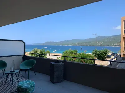 a balcony with a view of the ocean at Fronte di Mare in Propriano