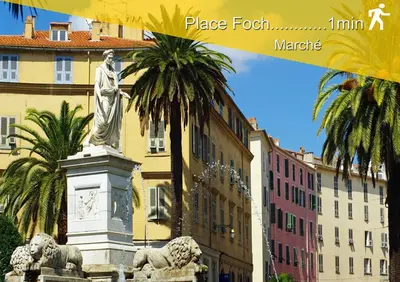 a statue in front of a building with palm trees at Le Studio du Cardinal Central/ Wifi/ Ajaccio à pieds! in Ajaccio
