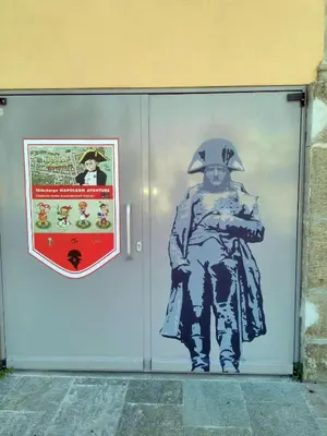 a door with a picture of a person on it at Le Studio du Cardinal Central/ Wifi/ Ajaccio à pieds! in Ajaccio