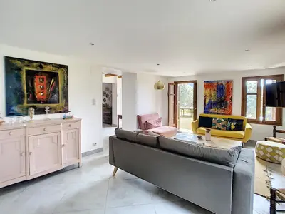 a large living room with a couch and chairs at Domaine de Tappa - Casa Filicina in Sollacaro