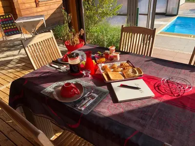 a table with a tray of food on it at Chalet zen in Peri