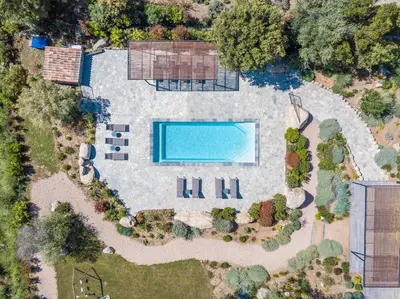 an aerial view of a backyard with a swimming pool at Villa 19 in Zonza