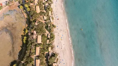 an overhead view of a beach and the ocean at Domaine Naturiste de Riva Bella in Linguizzetta
