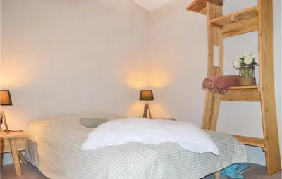 a bedroom with a bed and a loft bed at Amazing Home In Coti-Chiavari in Coti-Chiavari