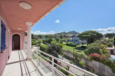 a balcony of a house with a view at Résidence Villa Romana avec Piscine et Jacuzzi in Propriano