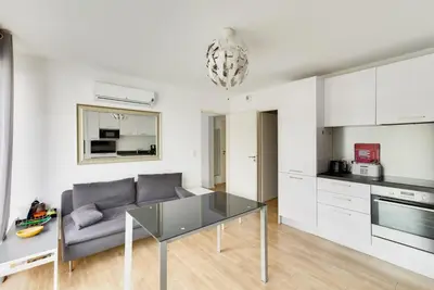 a living room with a couch and a glass table at L'Ebene in Coti-Chiavari