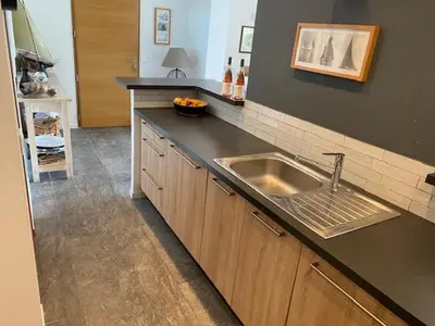 a bathroom with a sink and a mirror at Villas Valinco San Martinu Corse du Sud - vue et proche mer - piscines-7 chambres in Olmeto