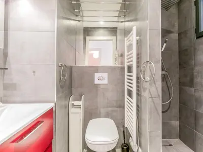 a bathroom with a shower and a toilet and a sink at Apartment Bastion-15 by Interhome in Porto-Vecchio