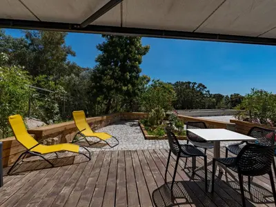 a swimming pool in the backyard of a house at Apartment Bastion-15 by Interhome in Porto-Vecchio