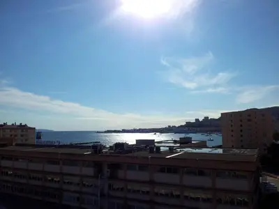 a view of the ocean from a building at Bel Orizonte, Grand appart 70m2 vue mer in Ajaccio