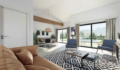 a living room with a couch and chairs and a table at Calarossa Bay Resort in Porto-Vecchio