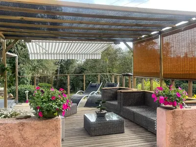 a patio with a skate park in the background at Chez Chris Mare & Macchia in Porto-Vecchio