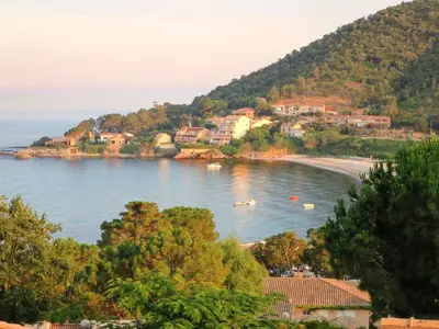 a view of a beach with boats in the water at Holiday Home Villa Ottavi by Interhome in Sainte-Lucie de Porto-Vecchio