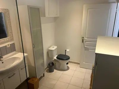 a bathroom with a toilet and a sink at Mini Villa - Corse du Sud in Lecci
