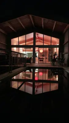 a house with a swimming pool at night at Villa Leccia di Lorello in Grosseto-Prugna