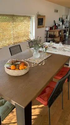 a table with a bowl of fruit on top of it at Villa Leccia di Lorello in Grosseto-Prugna