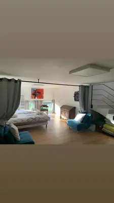 a bedroom with a bunk bed and a room with a bed at Villa Leccia di Lorello in Grosseto-Prugna