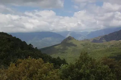 a view of a valley with mountains and trees at Chambre d'hôtes couvent d'Alando in Alando