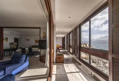 a living room with a view of the ocean at Appartement Front de Mer Hyper Centre in Ajaccio