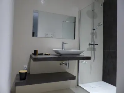 a bathroom with a sink and a shower at Villa Laricio in Bonifacio