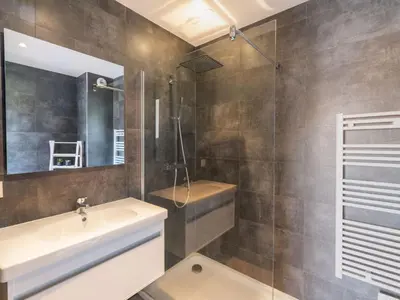 a bathroom with a sink and a shower at Apartment Château-19 by Interhome in Porto-Vecchio
