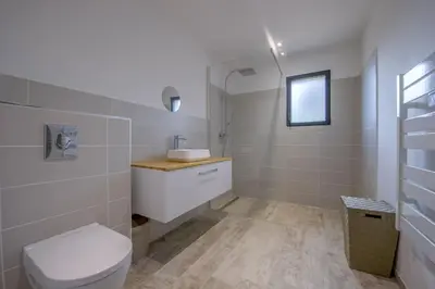 a bathroom with a toilet and a sink at Maison Del Onda in Lecci