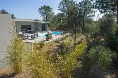 an aerial view of a house with a swimming pool at Maison Del Onda in Lecci
