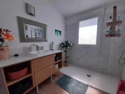 a bathroom with a sink and a shower at casa turchina chambre avec piscine privée in Porto-Vecchio