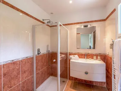 a bathroom with a shower and a sink at Apartment Muratello by Interhome in Porto-Vecchio