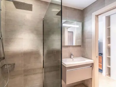 a bathroom with a shower and a sink at Studio Château-20 by Interhome in Porto-Vecchio