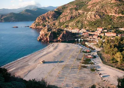 an aerial view of a beach with houses on a hill at I MONTI SIGNORI in Porto Ota