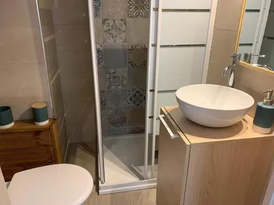 a bathroom with a toilet and a sink and a shower at Casa Lisà in Sartène