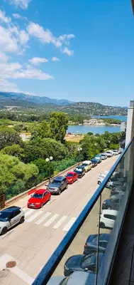 a view of a parking lot with cars parked at Appartement 2 pièces dans le centre historique de Porto Vecchio in Porto-Vecchio
