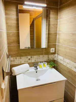 a bathroom with a sink and a mirror at 