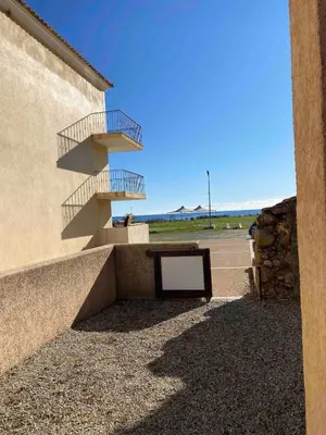 a stairway to a building with a sign on it at 