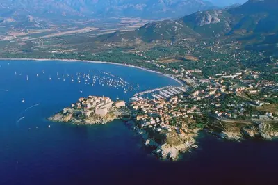 an aerial view of a small island in the water at T2 Loft entre mer et montagne in Calenzana